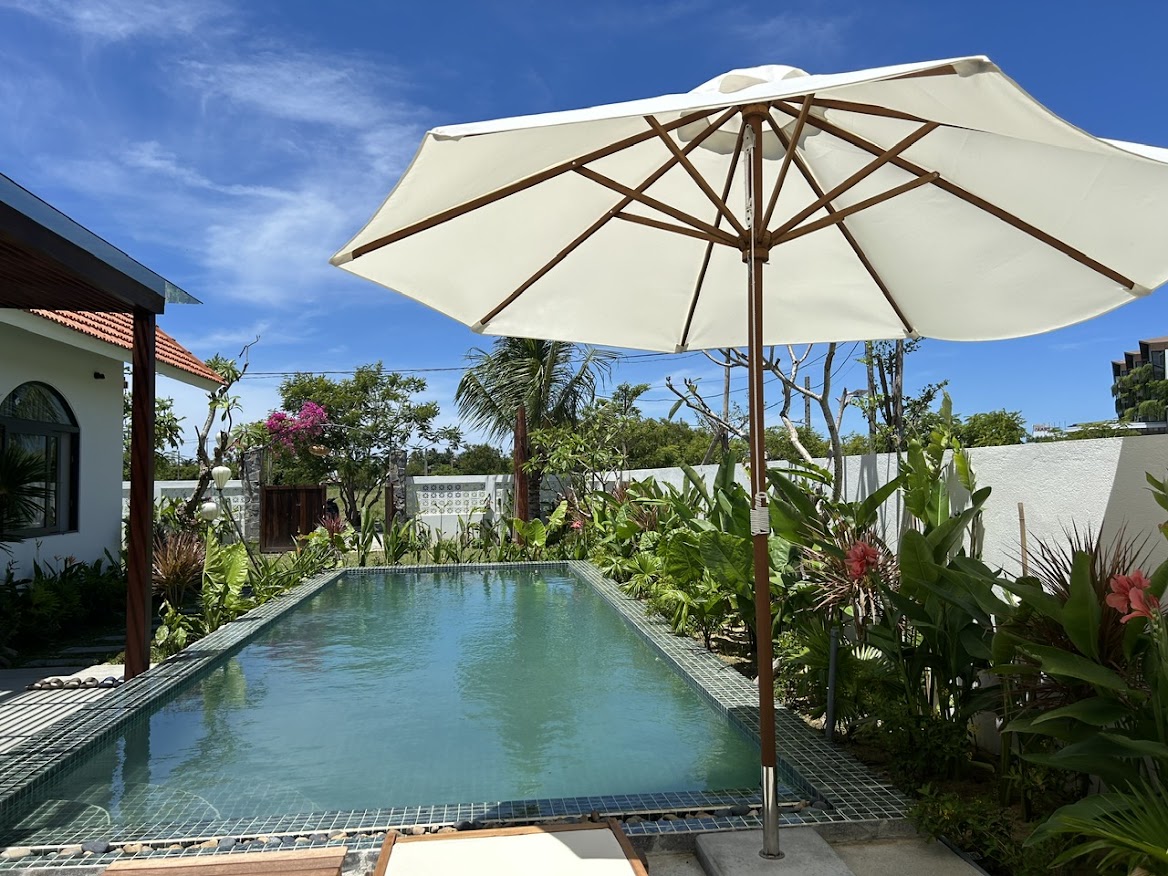 Contemporary tropical architecture at Ocean Nest Villa, 3-bedroom pool villa near Cua Dai Beach